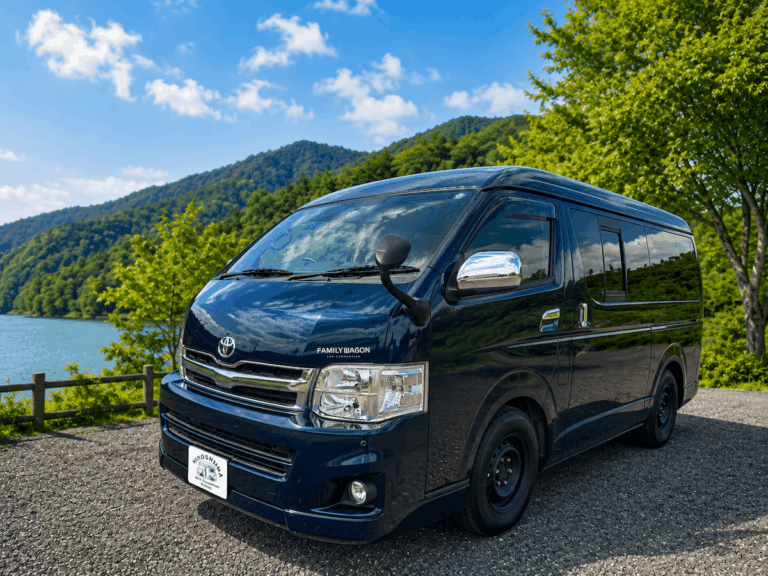 Family Campervan, a Toyota HiAce conversion, parked beside a lake in Hiroshima